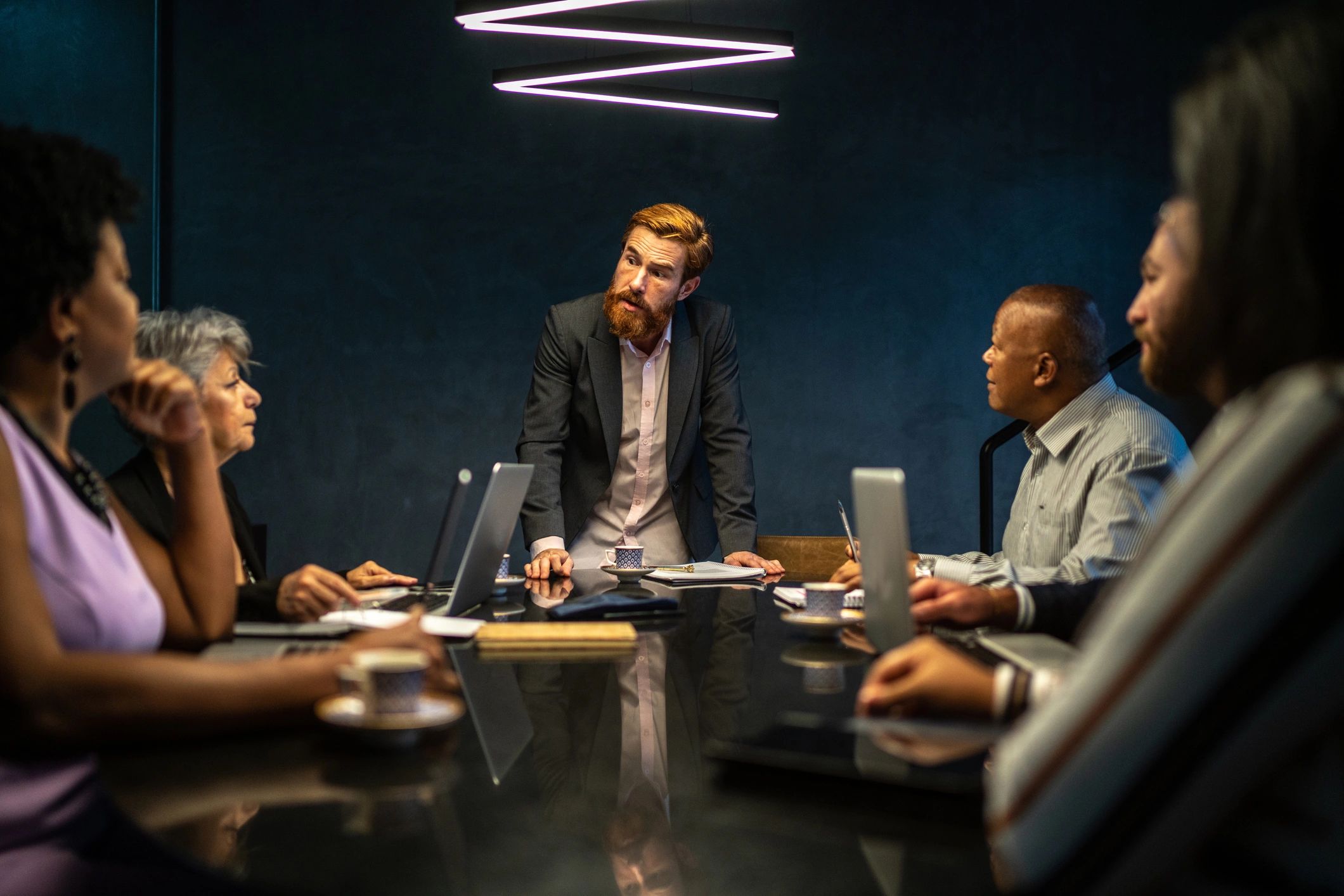 Business team reviewing a report in a meeting