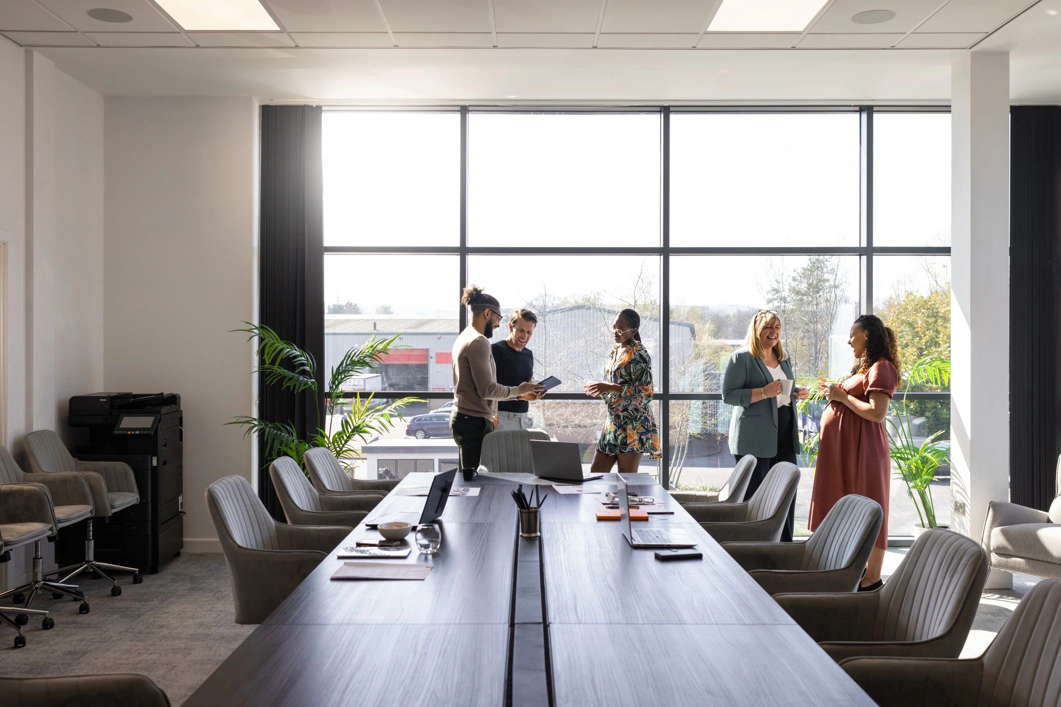 Business colleagues discussing strategy in a modern office